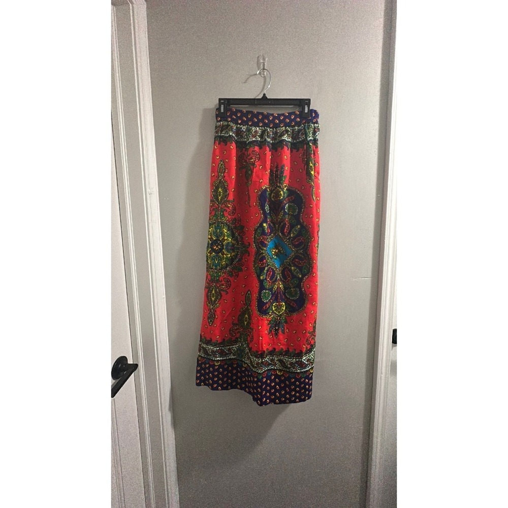 Malbe Original skirt features a glittery, psychedelic paisley print inspired
